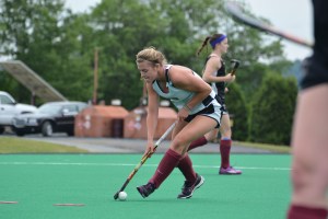 Meg Lillis moves the ball upfield during practice