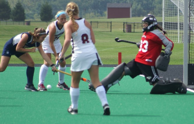 Kaitlyn Arnold kicks the ball away against the University of Connecticut last year
