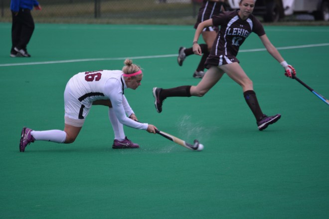 Kirby Szalkowski slips the ball past a Lehigh defender