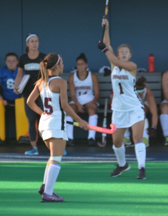 Senior Abbey Stefanides reaches for Penn ball in first action of the season for her