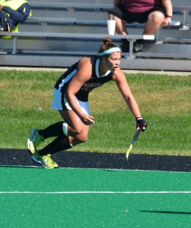Paige Macrae show her defensive skills as she blocks a Bucknell advance
